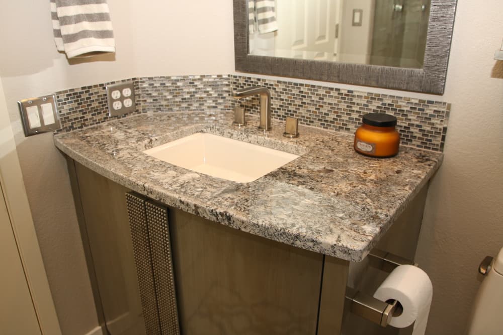 Granite Powder Room with Mosaic