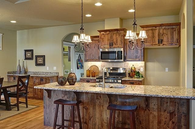 Granite Island with Rustic Cabinets