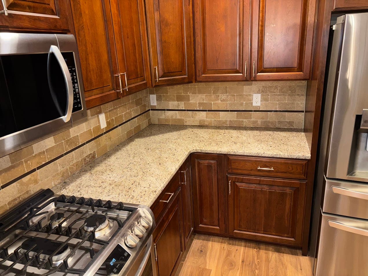 Granite with Tile Backsplash